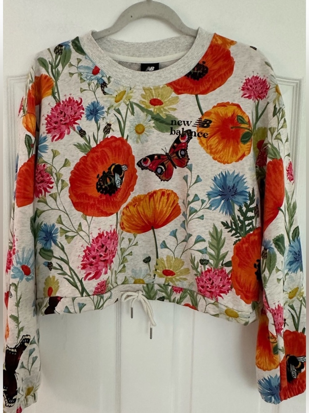 New Balance NWOT Women's Floral Drawstring Hem Sweatshirt - Orange, Pink, Blue